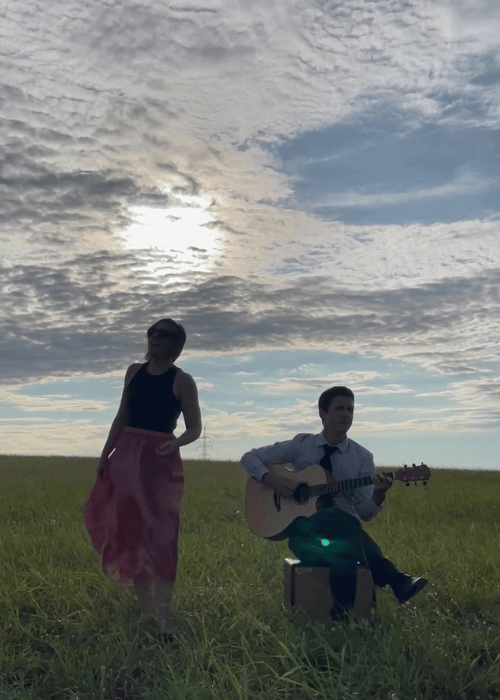AlmAcoustic Duo plays on an open-air wedding
